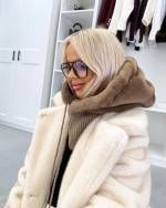 Must Kaelusega Müts